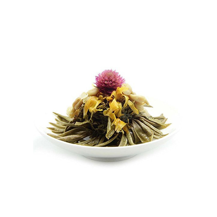 Набір в'язаного китайського чаю Шен Пуер "Перлина Дракона". Вид чайної перлини після розкривання.